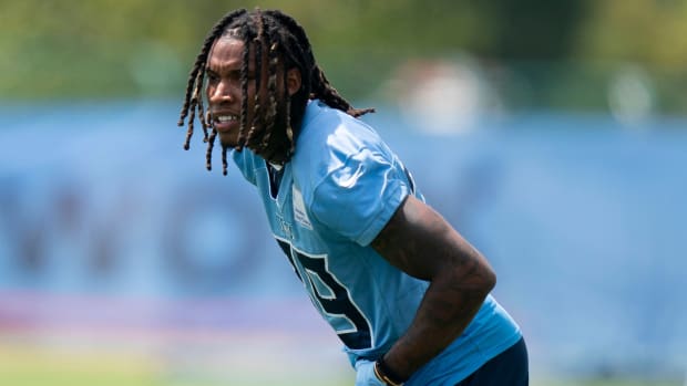 Tennessee Titans cornerback Lonnie Johnson Jr. (39) warms up during a training camp practice at Ascension Saint Thomas Sports Park Monday, Aug. 22, 2022, in Nashville, Tenn.